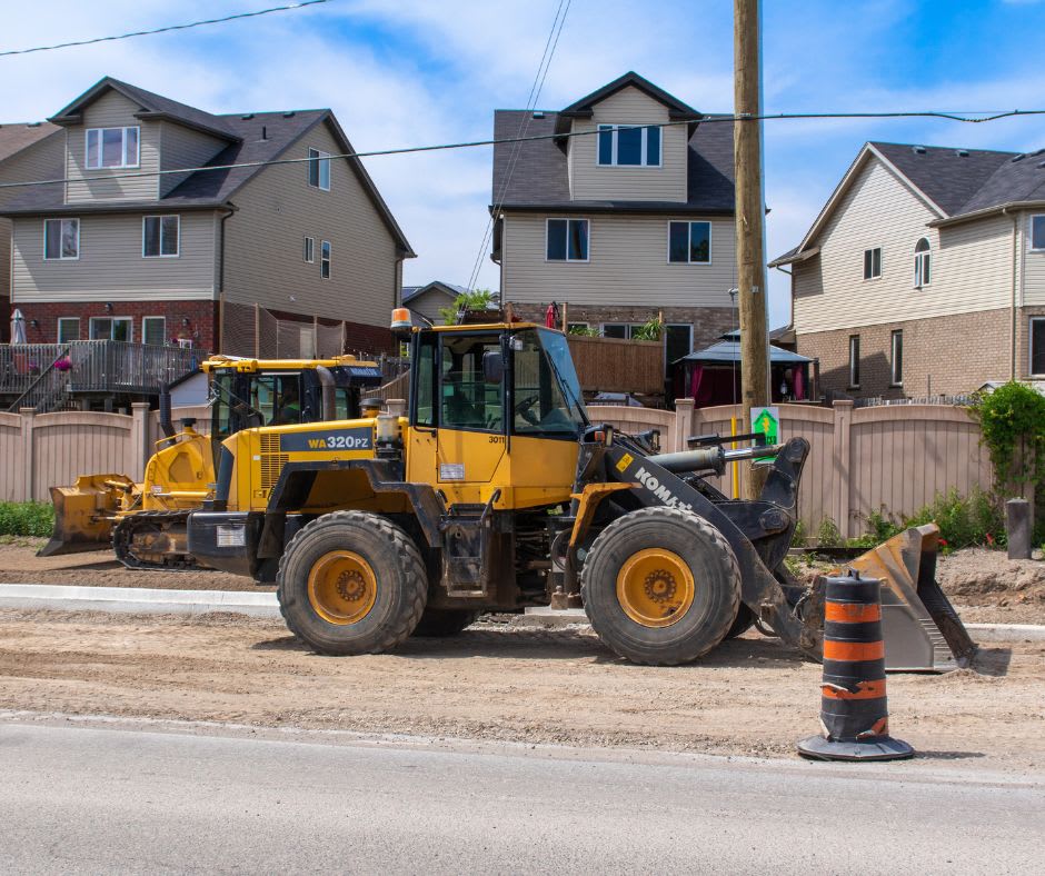 Komatsu 320 wheel loader on a road construction project